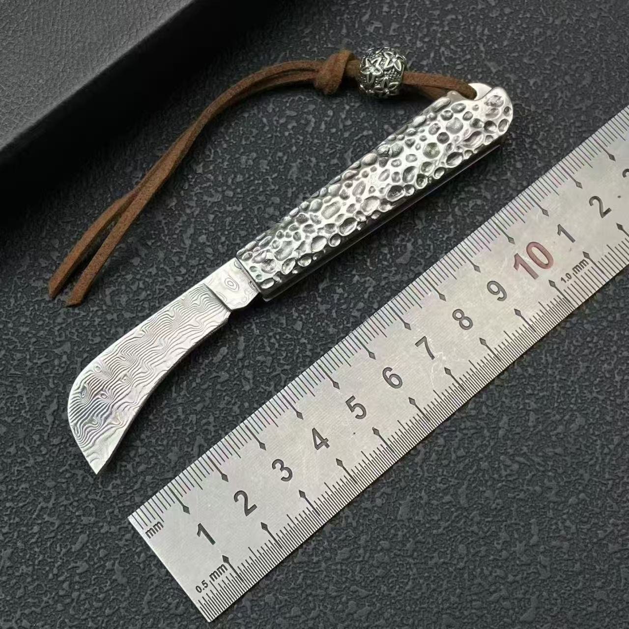 1df99ba3-ca2a-4adc-9b28-66ed10f7567f.jpeg Mini Cleaver-Style Damascus Folding Knife