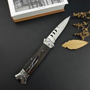 The New Version Of The Bouncy Fish Side-jumping Has A Brown Handle And A Chicken Wing Wood Handle Switchblade