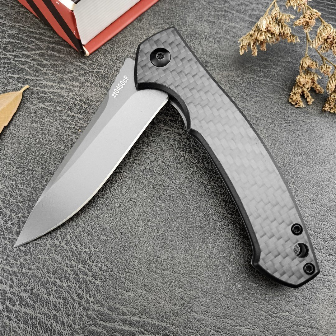 4034d6de-823c-44d3-9471-b94f46e39e7a.jpeg ZT0450 Folded Carbon Fiber Folding Knife