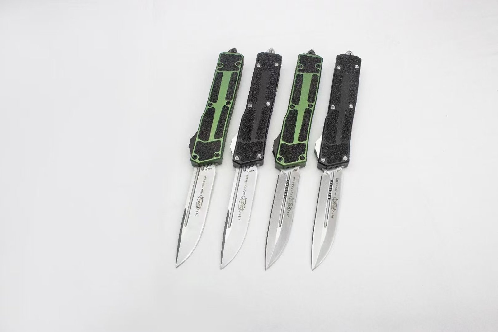41ab7e7c-719b-46bd-8589-5c42ddb4dd96.jpeg Microtech Navy Beetle 2nd Generation OTF Knife
