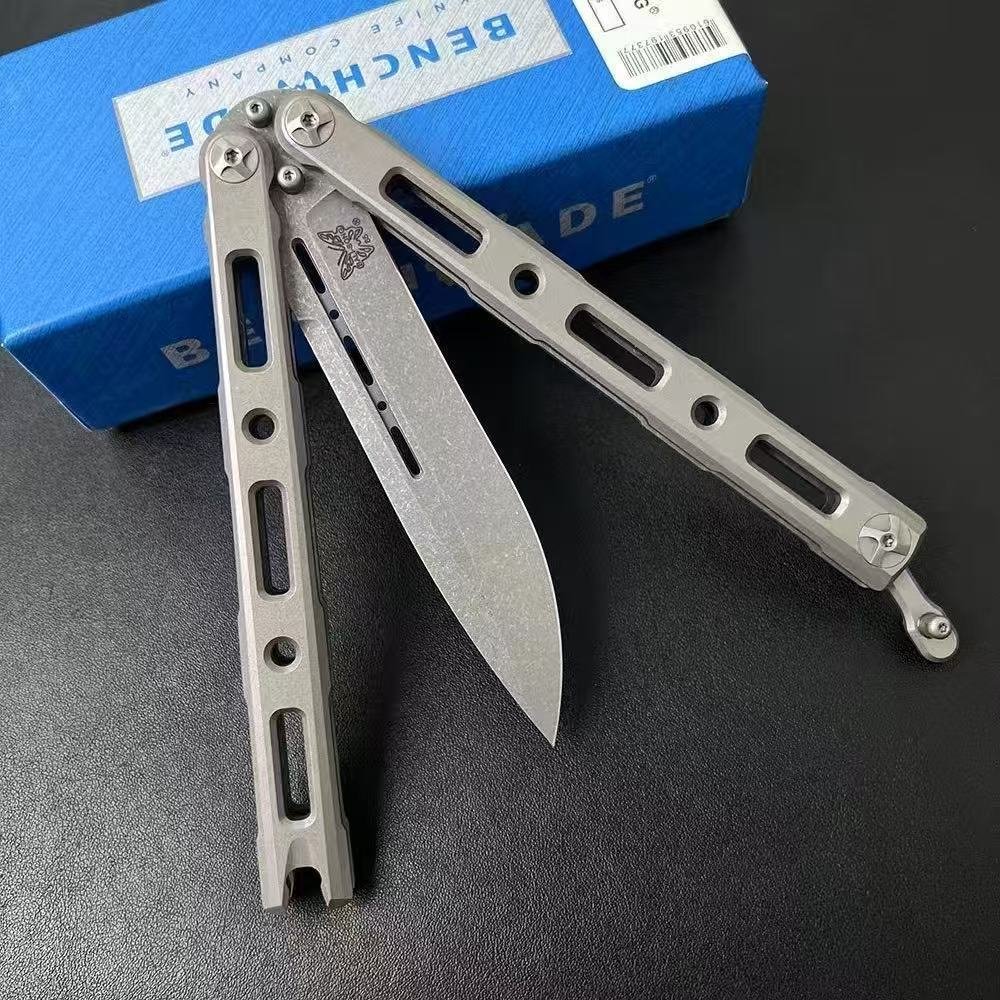 4cc362ee-00ff-4264-91cd-6662f5bbbf51.jpeg Butterfly BM85 Titanium Handle Butterfly Swing Magnetic Lock Folding Knife