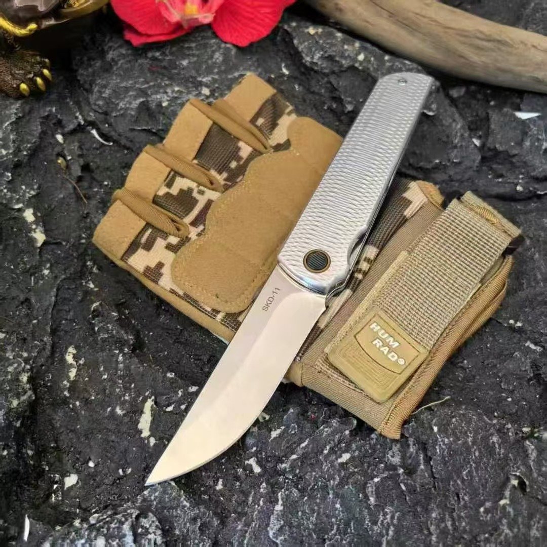 87d13cb5-7b39-4446-8f66-5d9b5a6dc6d8.jpeg The Silver Dragon Of The Northern Mountain Folding Knife
