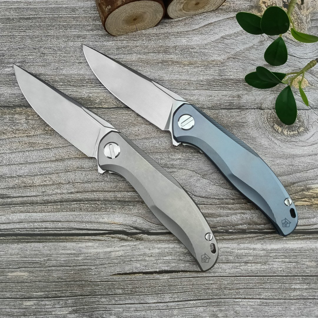 8aad81a2-a421-4324-a214-085f90de4600.jpeg Bear Head Star Titanium Alloy Handle Folding Knife