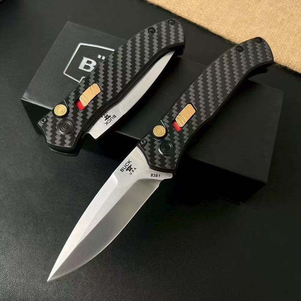 9528bdbb-9549-46ef-988d-a09657d7f3fa.jpeg Buck 838 Carbon-Fiber Handle Side-Opening Knife
