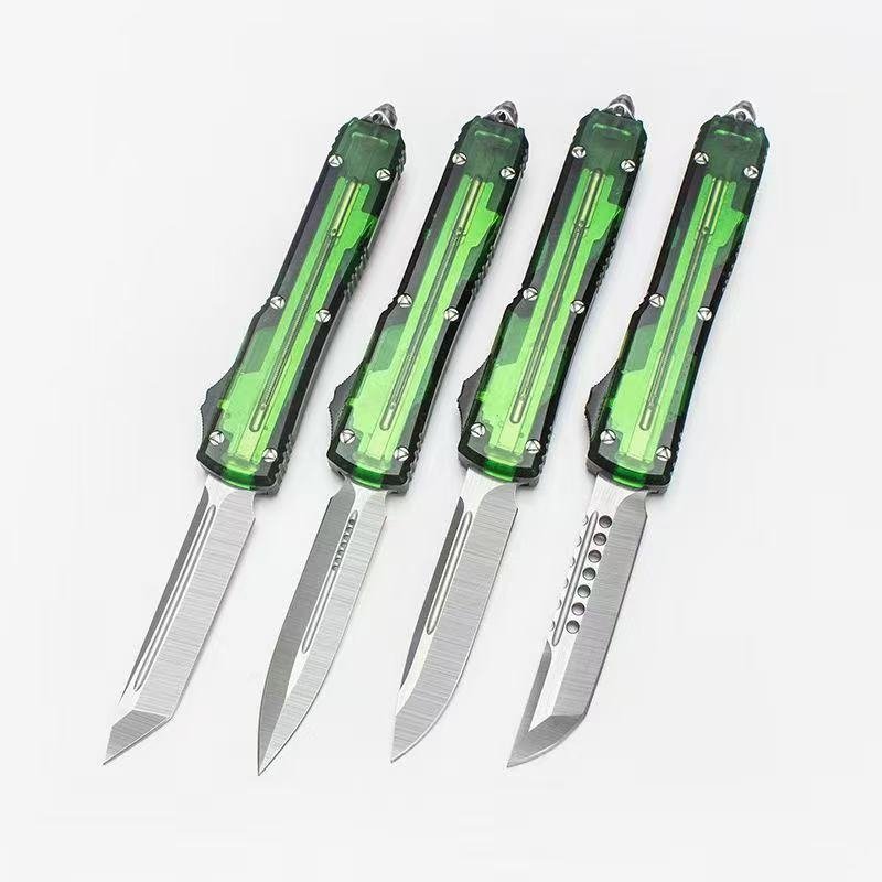 9b6c4a54-e21b-4a2d-9c13-3ef1f8e72ead.jpeg Microtech Clear UT Green-Handle OTF Knife