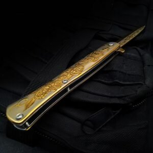 A Folding Knife Of A Gold-embossed Swordfish