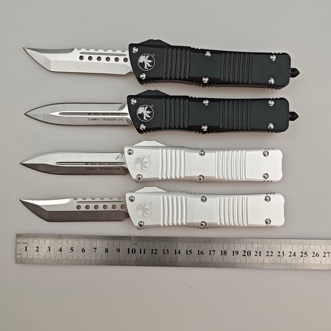 d2b5a92e-6506-470f-a716-65039365fdc0.jpeg Microtech Big Dragon Gen 2 OTF Knife with Dagger and Claw Logos