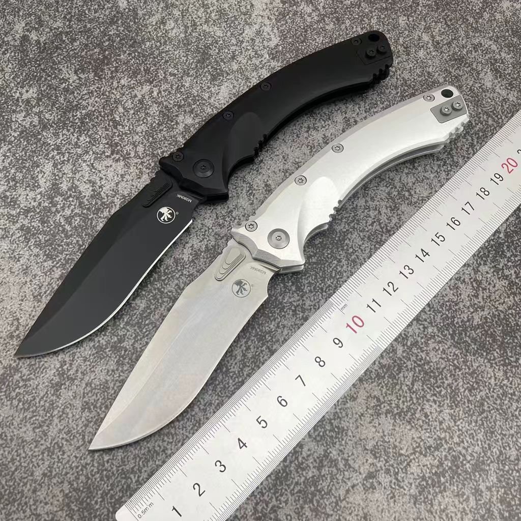 f476dbcf-812e-4bb3-913c-95b25a21d2ca.jpeg Microtech Amphibious Aluminum-Handle Folding Knife